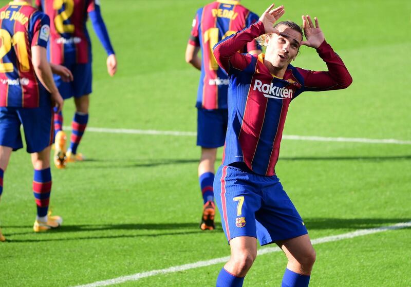 Barcelona's midfielder Antoine Griezmann celebrates scoring his team's second goal. AFP