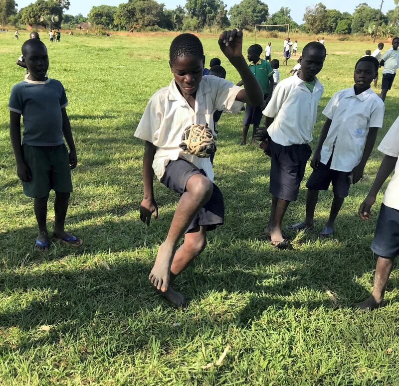 AMOLATAR, UGANDA Wednesday, November 22, 2017. An Ugandan pupil from Alemere Primary School in Amolatar, Uganda, shows off his dribbling skills with a ball made out of scraps of used fabric and plastic bags. Dubai Cares has donated funds to help make the primary school more accessible to children with special education needs. (Roberta Pennington/The National)