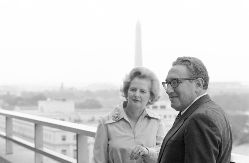 Future British prime minister Margaret Thatcher with Mr Kissinger in Washington, in 1975. AP