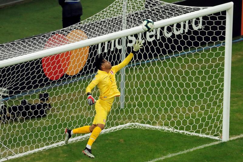 Peru's Pedro Gallese try to stop a penalty during the Copa America 2019 semi-finals soccer match between Chile and Peru at Arena do Gremio Stadium in Porto Alegre, Brazil.  EPA
