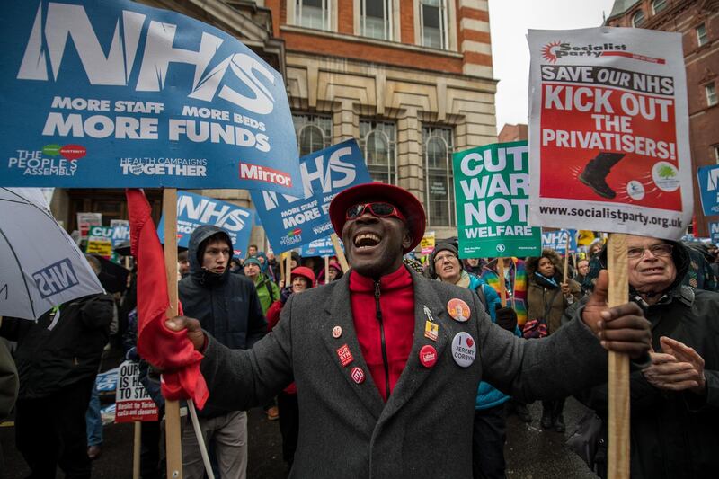 *** BESTPIX *** LONDON, ENGLAND - FEBRUARY 03:  Demonstrators chant and carry placards during a People's Assembly demonstration against the Conservative government's health policy on February 3, 2018 in London, England. The demonstration is focused on the current crisis in the National Health Service, NHS, as a demand in services has seen a surge during the winter months.  (Photo by Chris J Ratcliffe/Getty Images)