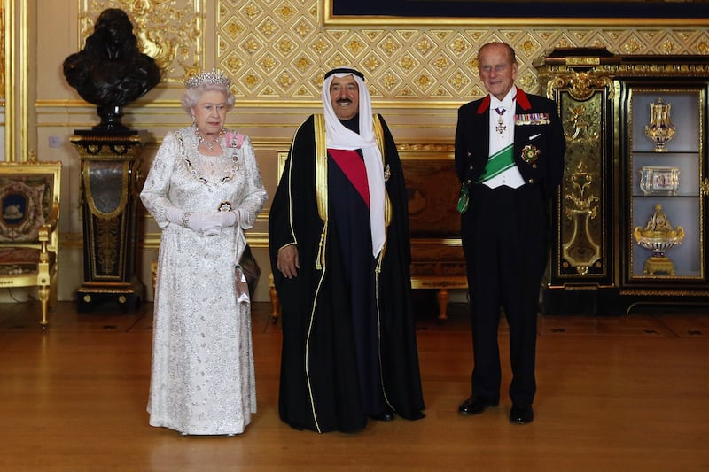 Sheikh Sabah Al Ahmad Al Sabah, Emir of Kuwait, poses with Queen Elizabeth and Prince Philip at Windsor Castle in November 2012. Getty Images