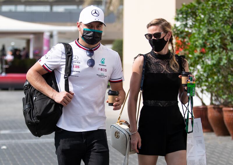 Mercedes driver Valtteri Bottas with his girlfriend Tiffany Cromwell at Yas Marina Circuit. Victor Besa / The National