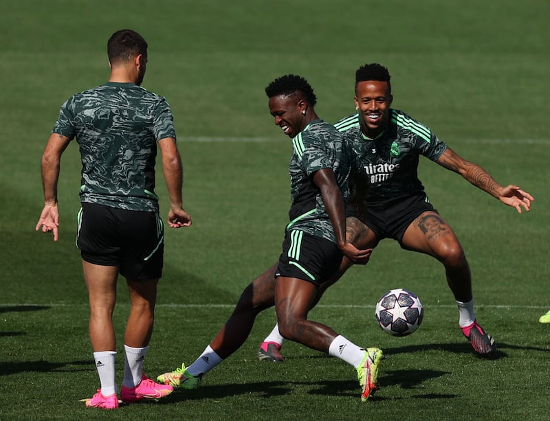 Real Madrid's Vinicius Junior, centre, and Eder Militao take part in a training session at Valdebebas Sport City. AFP