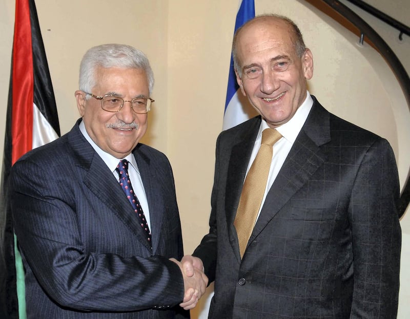 Israel's Prime Minister Ehud Olmert (R) greets Palestinian President Mahmoud Abbas during their meeting in Jerusalem September 16, 2008, in this picture released by the Israeli Government Press Office (GPO). A spokesman for Olmert told reporters that the two had held "serious" discussions in Jerusalem and would meet again after Abbas returns from a trip to the United States later this month. REUTERS/Moshe Milner/GPO/Handout (JERUSALEM).  FOR EDITORIAL USE ONLY. NOT FOR SALE FOR MARKETING OR ADVERTISING CAMPAIGNS. ISRAEL OUT. NO COMMERCIAL OR EDITORIAL SALES IN ISRAEL.
