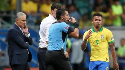 Brazil striker Gabriel Jesus, right, has a goal ruled out after VAR review in goalless draw against Paraguay. EPA