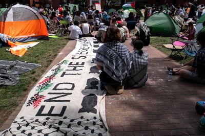 Activists and students at an encampment at University Yard at George Washington University. Getty Images