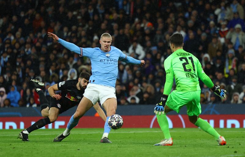 City's Erling Haaland in action with Leipzig's Janis Blaswich. Reuters