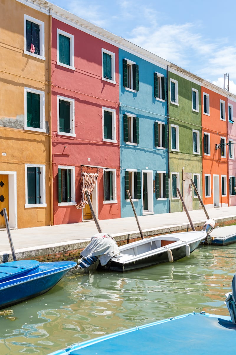 Burano attracts day-trippers thanks to its tiny waterways lined with multicoloured houses. Photo: Mattia Mionetto