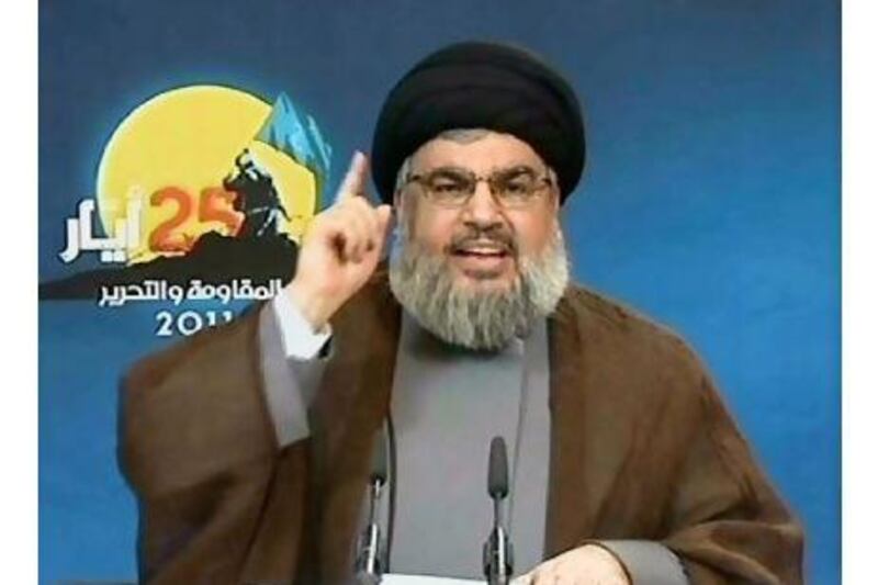 Hassan Nasrallah, the head of Hizbollah, delivers a speech via closed-circuit video from an undisclosed location yesterday to mark the 11th anniversary of the withdrawal of Israeli troops from Lebanese territory after 22 years of occupation, which the group observes as Liberation Day. AFP