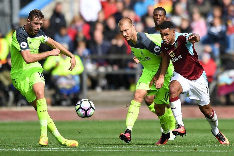 Burnley's Andre Gray, right, and Liverpool's Ragnar Klavan battle for the ball during their Premier League match at Turf Moor, Burnley, England, Saturday, August 20, 2016. Anthony Devlin / AP Photo