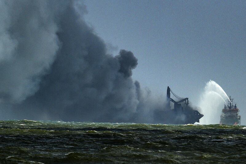 A Sri Lanka Navy ship tries to douse the fire on the 'MV X-Press Pearl'. AFP