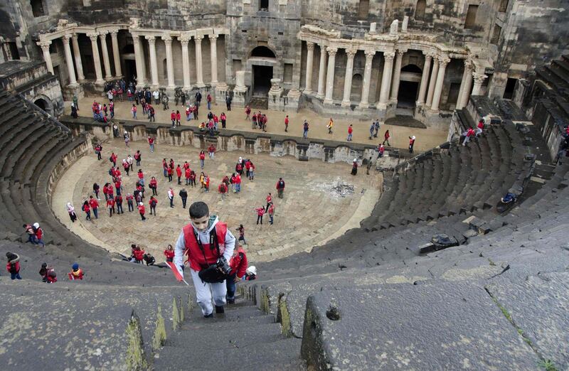 Scouts tour the Roman Theatre in Bosra, Daraa, Syria. AFP