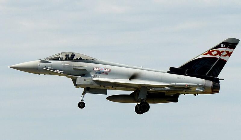 A Eurofighter Typhoon fighter aircraft produced by BAE Systems at the air show. Andy Rain / EPA