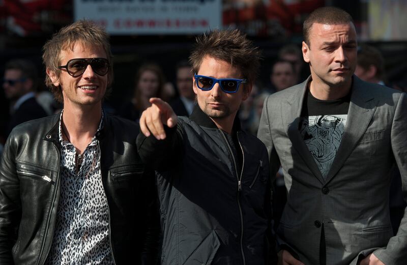 epa03728384 Members of the British rock band Muse attend the World premiere of 'World War Z' at the Empire, on Leicester Square in London, Britain, 02 June 2013. The movie opens in British theaters on 21 June.  EPA/DANIEL DEME *** Local Caption ***  03728384.jpg