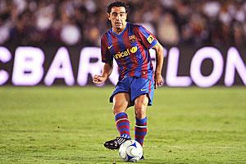 Xavi is the heartbeat of the team, often dictating the tempo of the game.