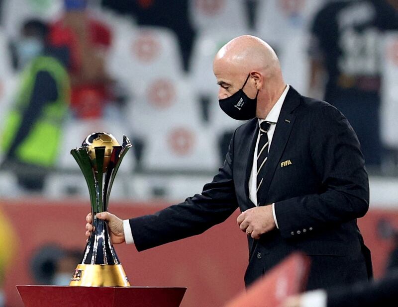 Fifa president Gianni Infantino with the Club World Cup trophy. Reuters