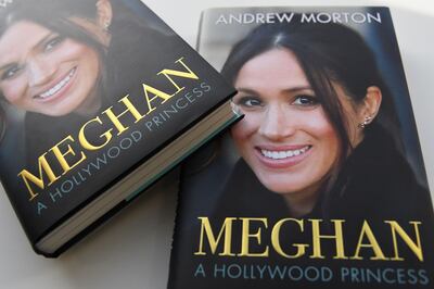 In this arranged photograph, the cover of the book entitled "Meghan, A Hollywood Princess", by author Andrew Morton, is pictured in London on April 6, 2018.
Meghan Markle had her heart set on becoming "Diana 2.0" from an early age, according to a new biography of Prince Harry's fiancee due out in Britain on Thursday. The US actress, who is set to marry her royal beau on May 19, is also fiercely protective of "Brand Meghan" and has a calculating streak, sidelining people as she moves ahead in life, the book claims. / AFP PHOTO / Daniel SORABJI