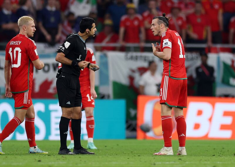 Gareth Bale argues with referee Abdulrahman Al Jassi. Getty