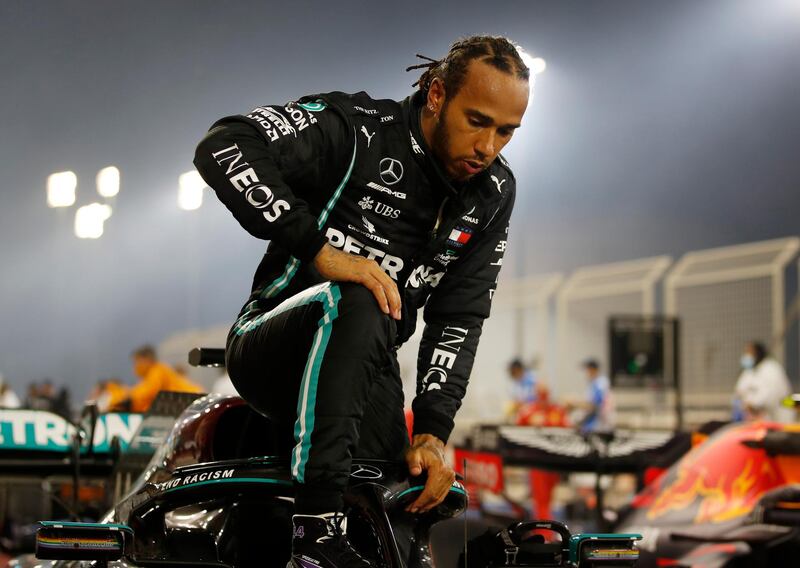 Lewis Hamilton celebrates after winning the race. Reuters