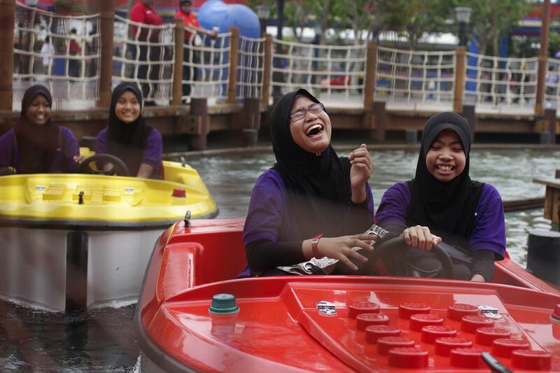 Girls ride in Lego-themed boats at Legoland Malaysia. Rahman Roslan / Bloomberg