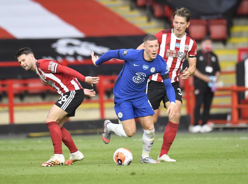 Ross Barkley of Chelsea, centre, controls the ball against Sheffield United. EPA
