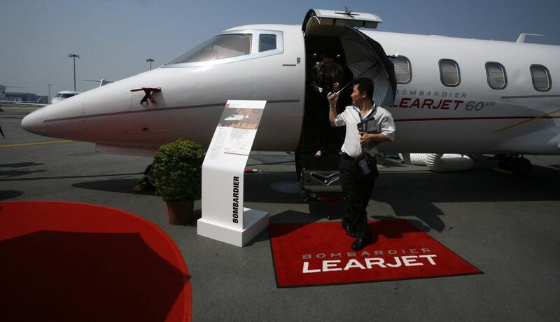 Visitors tour a Bombardier Learjet at the Asian Aerospace Expo in Hong Kong. Bobby Yip / Reuters