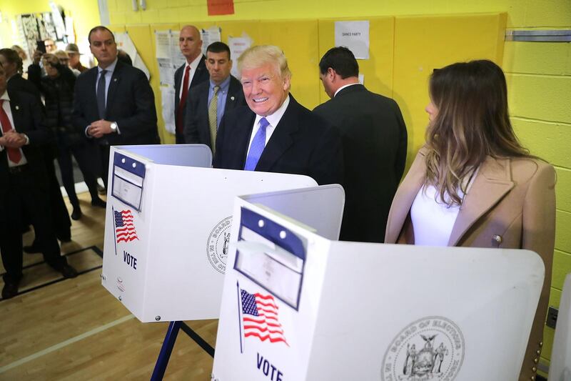 NEW YORK, NY - NOVEMBER 08: Republican presidential nominee Donald Trump and his wife Melania Trump cast their votes on Election Day at PS 59 November 8, 2016 in New York City. Trump's marathon final two days of campaigning marched through 10 cities in two days, stretching into Election Day.   Chip Somodevilla/Getty Images/AFP