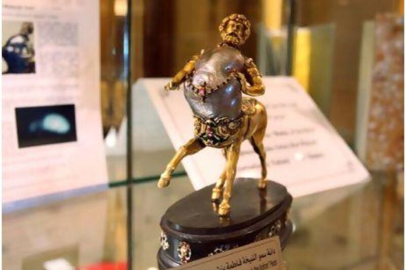 The Mother of the Nation pearl statuette of a centaur on display at the Emirates Palace hotel in Abu Dhabi.