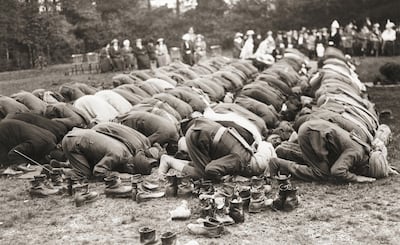 Indian troops serving with the British Army pray outside the Shah Jahan Mosque in Woking, Surrey, during the Muslim festival of Baqrid, or Eid al-Adha, (Festival of Sacrifice), circa 1916. (Photo by FPG/Hulton Archive/Getty Images)
