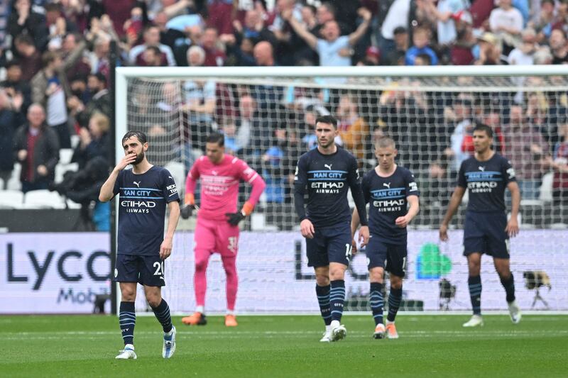 Manchester City's players after West Hams second goal. AFP