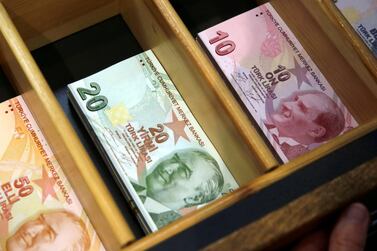 Turkish lira banknotes are pictured at a currency exchange office in Istanbul. Some investors fear a contagion affect on emerging market currencies as international investors remain stuck in Turkish lira. Reuters