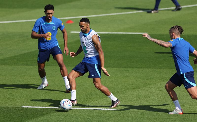 Left to right: England's Jude Bellingham, Callum Wilson  and Kalvin Phillips. Reuters