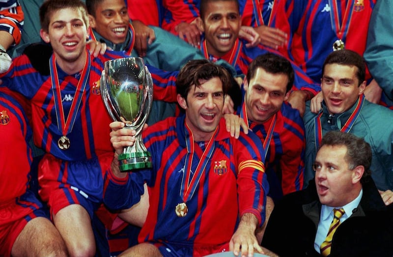 SPAIN - MARCH 11:  SUPERCUP 97/98 FC BARCELONA; Luis FIGO mit dem SUPERCUP  (Photo by Bongarts/Getty Images)