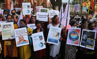 epa08855104 People from different human rights organizations hold placards during a protest against BJP-lead government and Chief Minister of Uttar Pradesh Yogi Adithyanath over the so-called 'love Jihad' law, in Bangalore, India, 01 December 2020. A group of protesters gathered to condemn the so-called 'love Jihad' term which is used to refer to inter-religious marriage involving Muslim men. The Uttar Pradesh government has passed an ordinance that provides a jail term of up to five years for 'forced conversions' in order to marry. Supporters of the law say it will help put an end to what they claim to be Muslim men reportedly targeting non-Muslim girls and persuading them into love and marriage for conversion into Islam. Criticizers say each person must have the right to choose their partner and that matters of belief cannot be watched by the state.  EPA/JAGADEESH NV