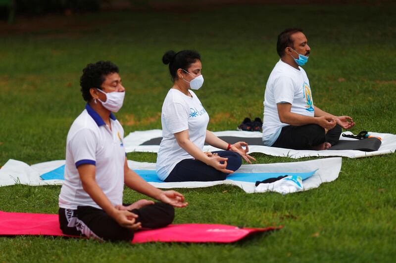 Participants perform yoga in New Delhi. Reuters