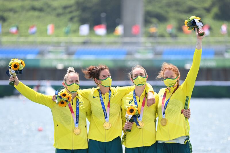 Australia's Lucy Stephan, Rosemary Popa, Jessica Morrison and Annabelle Mcintyre celebrate victory in the Women's Four.