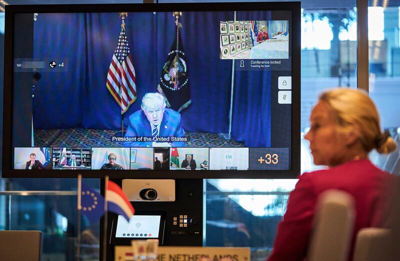 epa08593541 US President Donald J. Trump speaks as Dutch Minister for Development Cooperation Sigrid Kaag participates via a video connection with world leaders about aid to Lebanon in The Hague, the Netherlands, 09 August 2020. French President Macron organized the donor conference in collaboration with the UN after a large part of Beirut was destroyed by an explosion in the port.  EPA/PHIL NIJHUIS