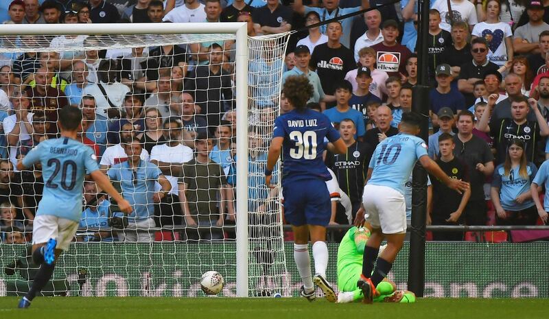 Soccer Football - FA Community Shield - Manchester City v Chelsea - Wembley Stadium, London, Britain - August 5, 2018 Manchester CityÕs Sergio Aguero scores their second goal REUTERS/Toby Melville