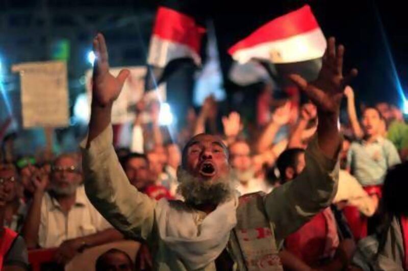 Supporters of Egypt's ousted president Mohammed Morsi protest outside Rabaah Al Adawiya mosque in Nasr City near Cairo.
