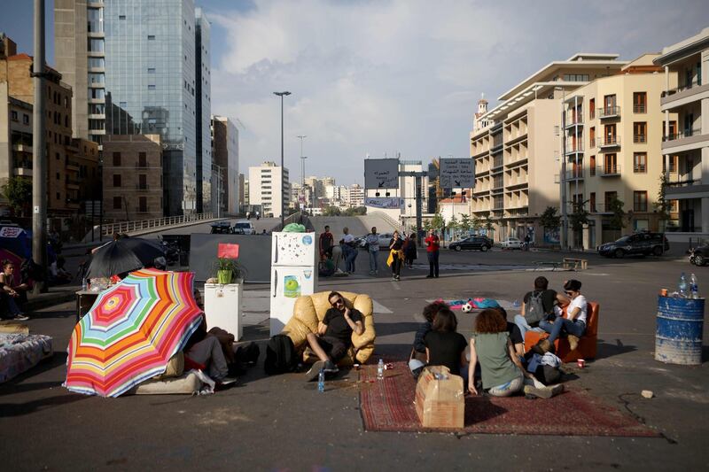 Before the Hezbollah and Amal supporters attacked, Lebanese anti-government protesters had blocked the Ring road bridge that crosses the heart of Beirut. AFP