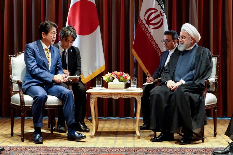 President Hassan Rouhani, right, meets Japanese Prime Minister Shinzo Abe, left, on the sideline of the United Nations General Assembly at the United Nations.  AP