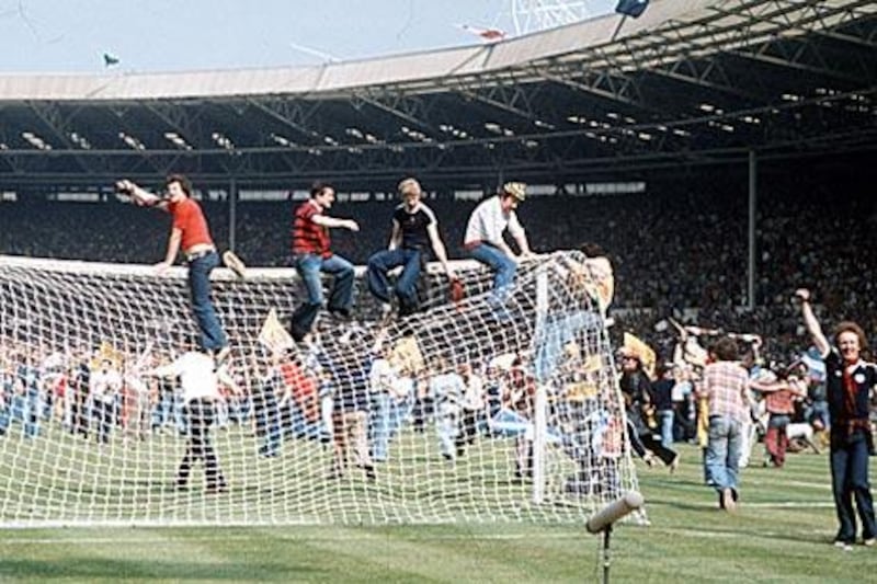 Scotland fans invade the Wembley pitch and destroy the goalposts following their side's 2-1 victory in the Home International match against the "Auld Enemy" England on June 4, 1977. The last of these fiercely contested fixtures - on and off the pitch - took place in 1984.