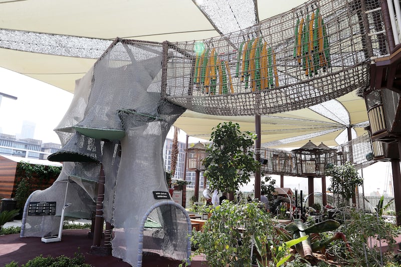 The outdoor playground also features a treehouse with viewing decks, slides and hanging bridges