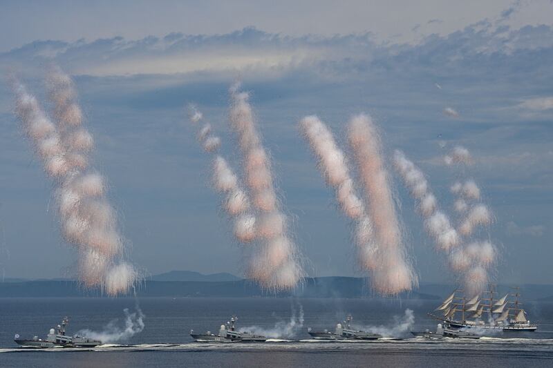 Russia's Pacific Fleet warships parade off the coast of Vladivostok during Navy Day celebrations. AFP