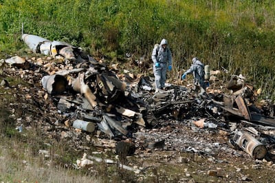 A picture taken in the northern Israeli Kibbutz of Harduf on February 10, 2018, shows the remains of an Israel F-16 that crashed after coming under fire by Syrian air defences during attacks against "Iranian targets" in the war-torn country. / AFP PHOTO / Jack GUEZ