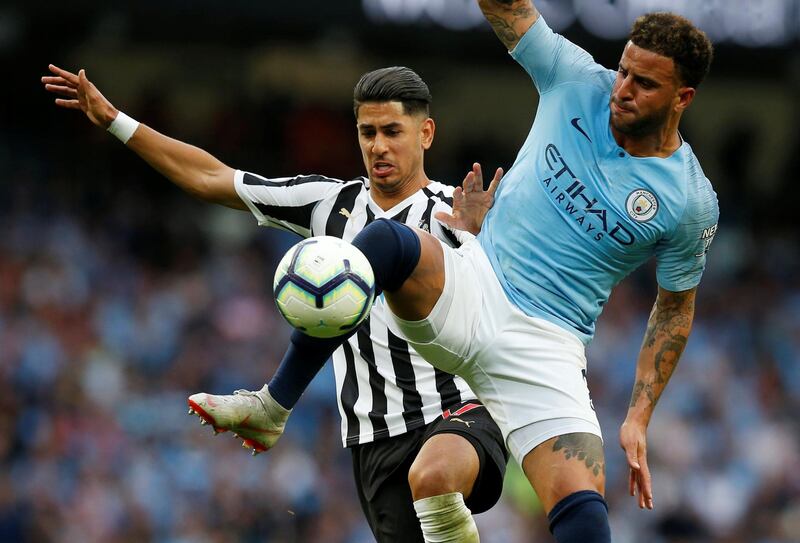 Soccer Football - Premier League - Manchester City v Newcastle United - Etihad Stadium, Manchester, Britain - September 1, 2018  Manchester City's Kyle Walker in action with Newcastle United's Ayoze Perez   REUTERS/Andrew Yates  EDITORIAL USE ONLY. No use with unauthorized audio, video, data, fixture lists, club/league logos or "live" services. Online in-match use limited to 75 images, no video emulation. No use in betting, games or single club/league/player publications.  Please contact your account representative for further details.