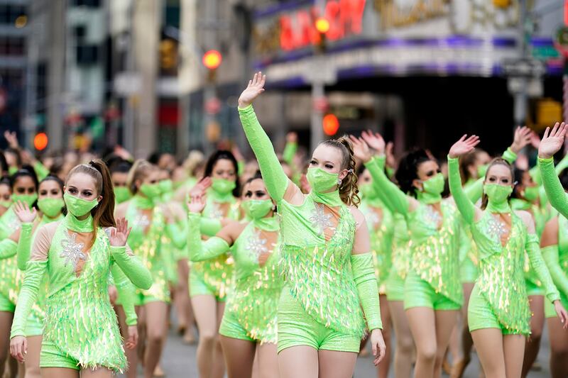 Masked marchers at the Thanksgiving Day Parade. AP