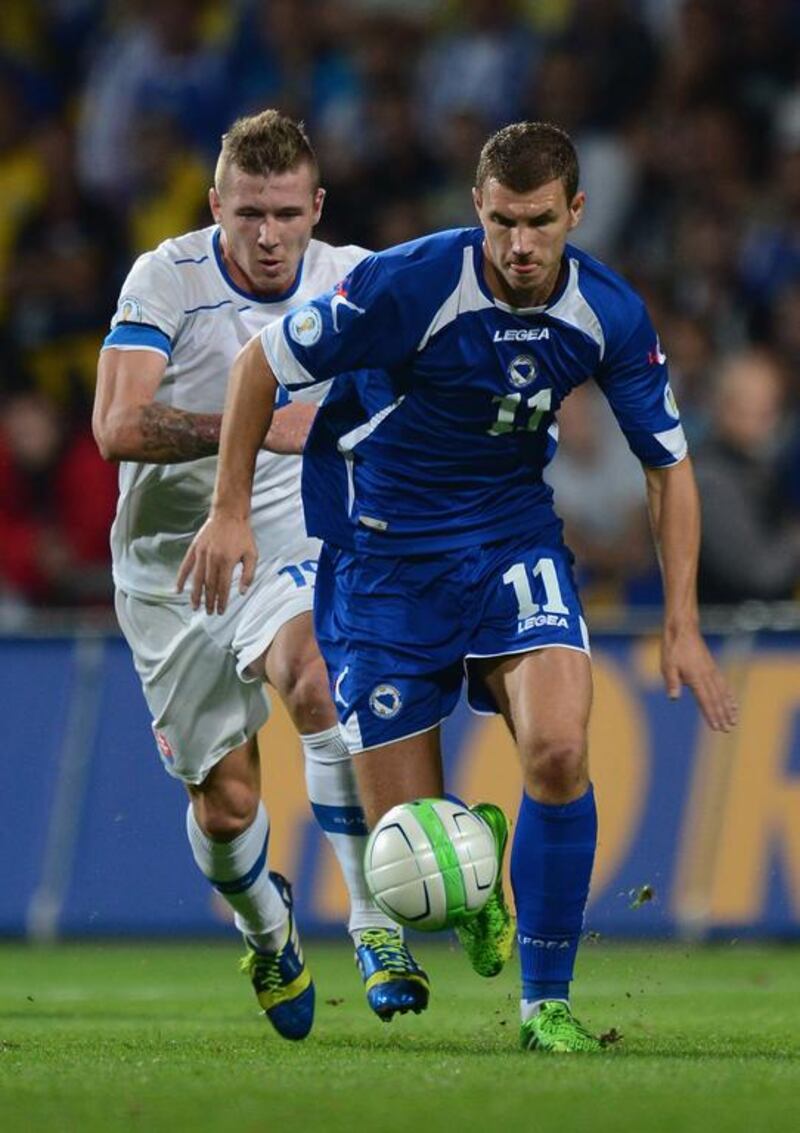Edin Dzeko has been a big reason for Bosnia's progression onto the world stage. Jamie McDonald / Getty Images

