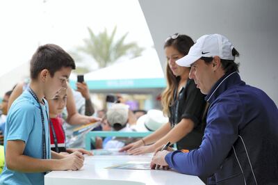 Abu Dhabi, United Arab Emirates - Reporter: Jon Turner: Rafael Nadal signs autographs at the Mubadala World Tennis Championship. Thursday, December 19th, 2019. Zayed Sports City, Abu Dhabi. Chris Whiteoak / The National